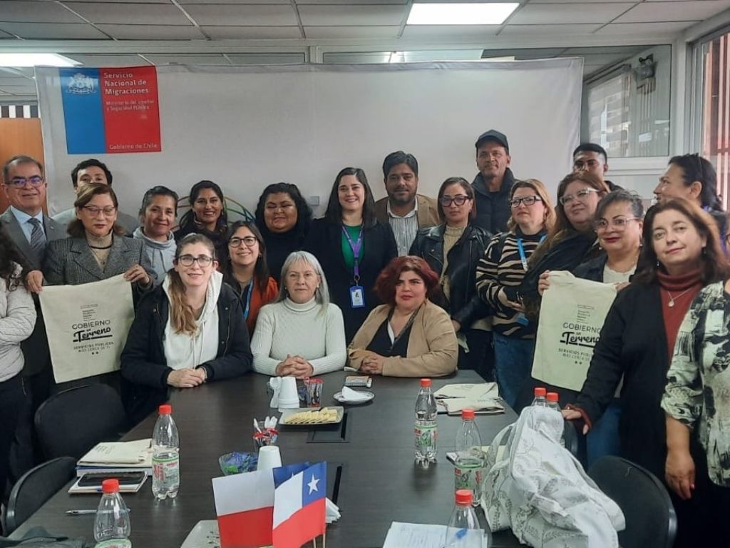 Participantes en dialógo participativo